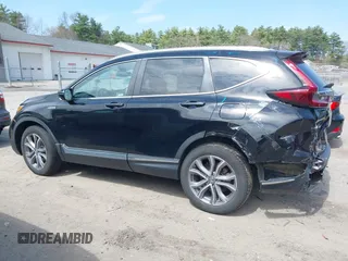 2020 Honda CR-V Touring with VIN 7FART6H96LE023782, listed as a IAAI auction lot 42053948 with 56,814 mi miles and . Bid and sale history available at DreamBid. Image 14.