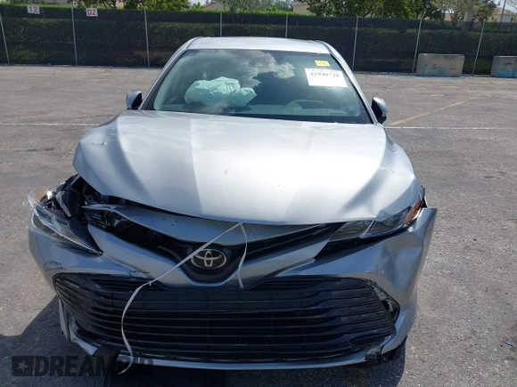 2019 Toyota Camry LE with VIN 4T1B11HK4KU249720, listed as a IAAI auction lot 41940728 with 35,891 mi miles and . Bid and sale history available at DreamBid. Image 6.