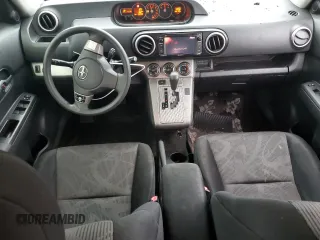 2014 Scion xB z VIN JTLZE4FE7EJ049074, wystawiony jako Copart lot #85734414 z przebiegiem 102 358 mil mil oraz Szkoda całkowita • Salvage title. Historia ofert i sprzedaży dostępna na DreamBid. Obrazek 8.