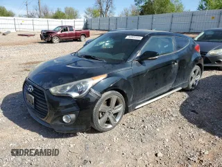 2013 Hyundai Veloster Turbo z VIN KMHTC6AE2DU169366, wystawiony jako Copart lot #50805585 z przebiegiem 75 197 mil mil oraz Szkoda całkowita • Salvage title. Historia ofert i sprzedaży dostępna na DreamBid. Obrazek 1.