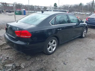 2012 Volkswagen Passat SE with VIN 1VWBP7A38CC033611, listed as a IAAI auction lot 41855933 with 155,429 mi miles. Bid and sale history available at carsss.com. Image 4.
