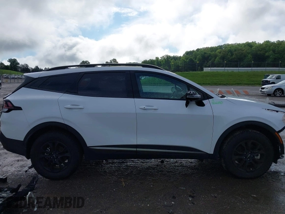 2023 Kia Sportage X-Pro Prestige z VIN 5XYK7CAF6PG135612, wystawiony jako IAAI lot #42244280 z przebiegiem 7 084 mil mil oraz . Historia ofert i sprzedaży dostępna na DreamBid. Obrazek 14.