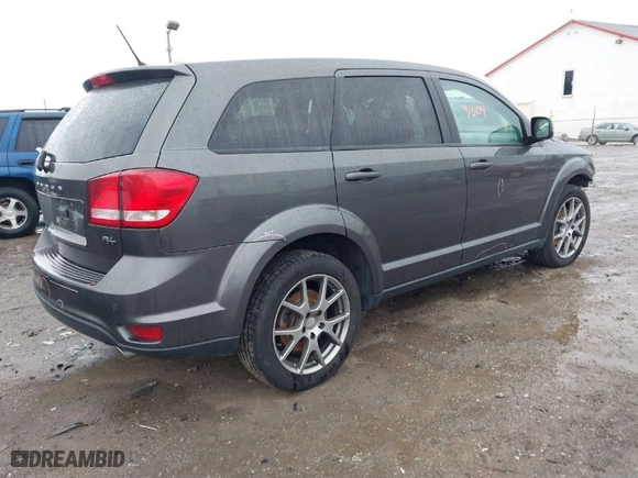 2015 Dodge Journey R/T with VIN 3C4PDDEG4FT680609, listed as a IAAI auction lot 41733309 with 124,121 mi miles. Bid and sale history available at carsss.com. Image 4.