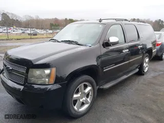 2011 Chevrolet Suburban LTZ with VIN 1GNSCKE02BR206544, listed as a IAAI auction lot 41159341 with 218,202 mi miles. Bid and sale history available at carsss.com. Image 17.