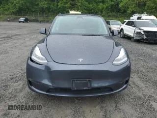 2021 Tesla Model Y Long Range z VIN 5YJYGDEE6MF233205, wystawiony jako Copart lot #58011025 z przebiegiem 48 419 mil mil oraz Szkoda całkowita • Salvage title. Historia ofert i sprzedaży dostępna na DreamBid. Obrazek 5.