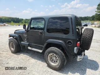 2001 Jeep Wrangler Sport с VIN 1J4FA49S91P347090, выставлен на аукционе Copart как лот 60436405 с пробегом 141 172 миль миль и Списание • Salvage title. История ставок и продаж доступна на DreamBid. Изображение 2.