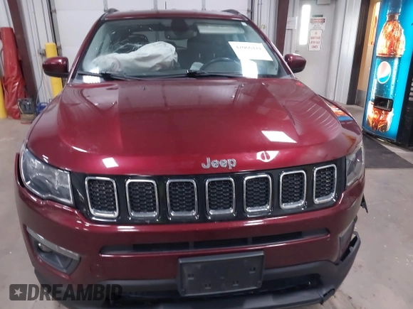 2021 Jeep Compass Altitude with VIN 3C4NJDBB8MT547261, listed as a IAAI auction lot 42066421 with 99,188 mi miles and . Bid and sale history available at DreamBid. Image 12.