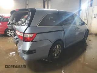 2013 Honda Odyssey EX-L with VIN 5FNRL5H64DB080141, listed as a Copart auction lot 49553235 with 128,358 mi miles and Salvage Title. Bid and sale history available at carsss.com. Image 3.