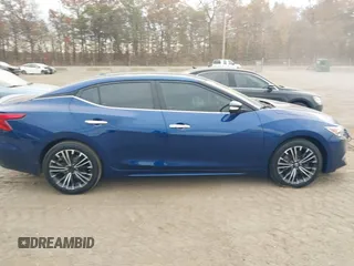 2016 Nissan Maxima Platinum z VIN 1N4AA6AP4GC414364, wystawiony jako IAAI lot #40738491 z przebiegiem 97 889 mil mil oraz . Historia ofert i sprzedaży dostępna na DreamBid. Obrazek 13.