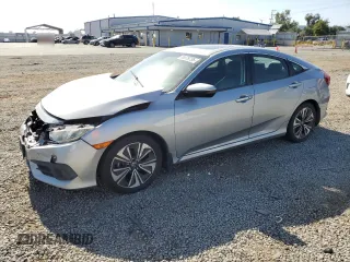 2016 Honda Civic EX-L with VIN 2HGFC1F7XGH654779, listed as a Copart auction lot 58079795 with 126,153 mi miles and Salvage title. Bid and sale history available at DreamBid. Image 1.