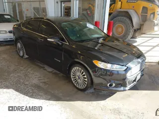 2014 Ford Fusion Titanium Hybrid with VIN 3FA6P0RU1ER290290, listed as a IAAI auction lot 41671735 with 207,405 mi miles. Bid and sale history available at carsss.com. Image 1.