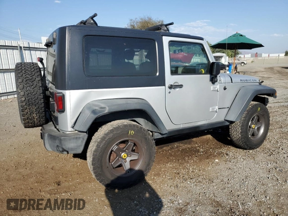 2009 Jeep Wrangler Rubicon with VIN 1J4GA64149L757121, listed as a Copart auction lot 74258934 with 73,241 mi miles and Salvage Title. Bid and sale history available at DreamBid. Image 3.