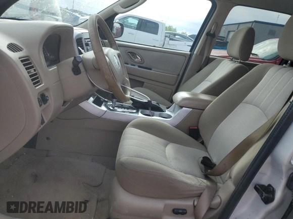2007 Mercury Mariner with VIN 4M2CU39H37KJ19438, listed as a Copart auction lot 57053375 with 136,893 mi miles and Clean title. Bid and sale history available at DreamBid. Image 7.