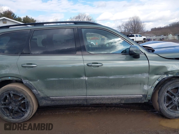 2023 Kia Telluride EX X-Line z VIN 5XYP3DGC8PG338845, wystawiony jako IAAI lot #41665367 z przebiegiem 63 595 mil mil oraz . Historia ofert i sprzedaży dostępna na DreamBid. Obrazek 14.