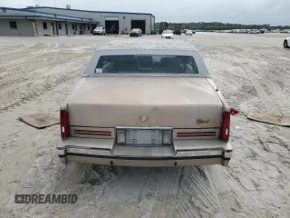 1991 Cadillac Eldorado z VIN 1G6EL13B4MU604636, wystawiony jako Copart lot #79155234 z przebiegiem Nie podano mil oraz Nie do naprawy. Historia ofert i sprzedaży dostępna na DreamBid. Obrazek 6.