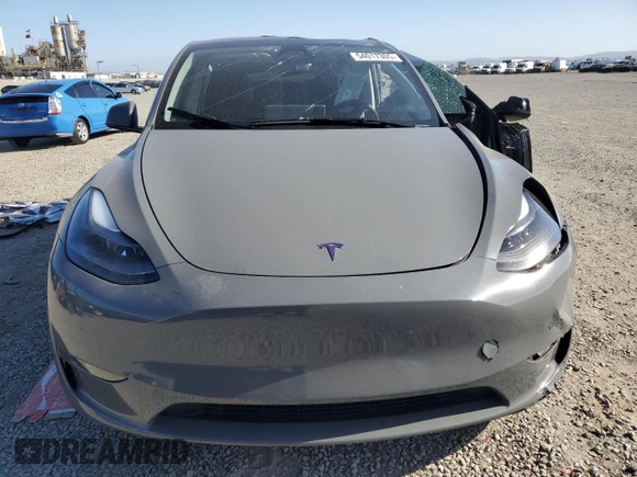 2024 Tesla Model Y Long Range with VIN 7SAYGDEE1RA245642, listed as a Copart auction lot 55490385 with Not provided miles and Salvage title. Bid and sale history available at DreamBid. Image 5.