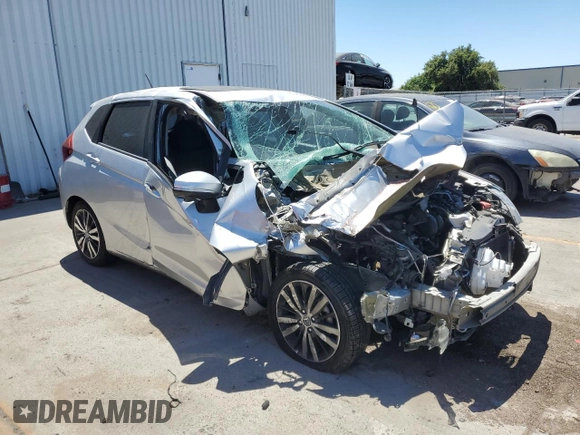 2015 Honda Fit EX-L with VIN 3HGGK5H84FM749729, listed as a Copart auction lot 61450914 with Not Provided miles and Salvage Title. Bid and sale history available at DreamBid. Image 4.