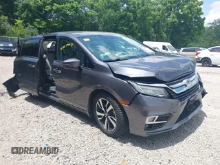 2018 Honda Odyssey Elite with VIN 5FNRL6H95JB087952, listed as a IAAI auction lot 42579817 with 96,577 mi miles and . Bid and sale history available at DreamBid. Image 1.