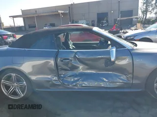 2014 Audi S5 Premium Plus z VIN WAUCGAFH4EN001316, wystawiony jako IAAI lot #41425673 z przebiegiem 97 089 mil mil oraz . Historia ofert i sprzedaży dostępna na DreamBid. Obrazek 13.