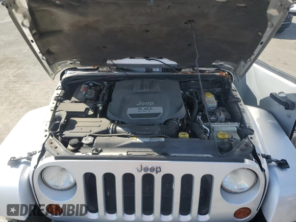 2012 Jeep Wrangler Unlimited Altitude z VIN 1C4HJWEG3CL169991, wystawiony jako Copart lot #45489175 z przebiegiem Nie podano mil oraz Szkoda całkowita • Salvage title. Historia ofert i sprzedaży dostępna na DreamBid. Obrazek 12.