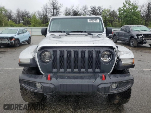 2023 Jeep Wrangler Rubicon with VIN 1C4JJXFM4PW589923, listed as a Copart auction lot 58725465 with 9,814 mi miles and Salvage title. Bid and sale history available at DreamBid. Image 5.