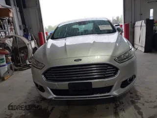 2013 Ford Fusion SE Hybrid with VIN 3FA6P0LU2DR319335, listed as a IAAI auction lot 42007573 with 135,099 mi miles. Bid and sale history available at carsss.com. Image 6.
