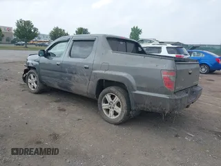 2013 Honda Ridgeline RTL with VIN 5FPYK1F56DB004834, listed as a IAAI auction lot 42706361 with 230,000 mi miles and . Bid and sale history available at DreamBid. Image 3.