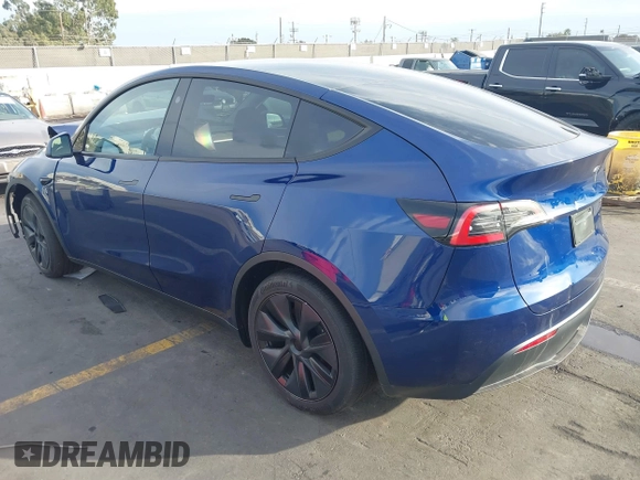 2025 Tesla Model Y Long Range with VIN 7SAYGDED2SF219423, listed as a IAAI auction lot 40984912 with 728 mi miles and . Bid and sale history available at DreamBid. Image 3.