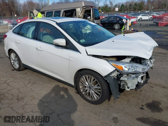 2018 Ford Focus Titanium z VIN 1FADP3J25JL293835, wystawiony jako IAAI lot #41877487 z przebiegiem 109 211 mil mil oraz . Historia ofert i sprzedaży dostępna na DreamBid. Obrazek 1.