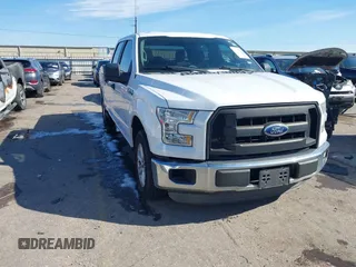 2015 Ford F-150 XL with VIN 1FTEW1CG5FFA61157, listed as a IAAI auction lot 41299436 with 145,310 mi miles. Bid and sale history available at carsss.com. Image 1.