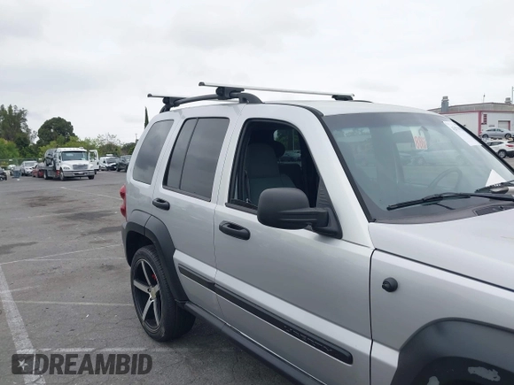 2007 Jeep Liberty Sport with VIN 1J4GK48K67W511199, listed as a IAAI auction lot 42079058 with 156,699 mi miles. Bid and sale history available at carsss.com. Image 6.