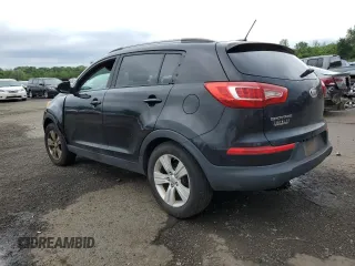 2011 Kia Sportage LX with VIN KNDPBCA24B7012852, listed as a Copart auction lot 63837085 with 186,805 mi miles and Salvage title. Bid and sale history available at DreamBid. Image 2.