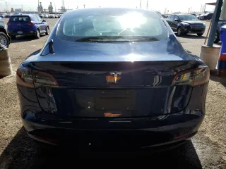 2022 Tesla Model 3 with VIN 5YJ3E1EA9NF288499, listed as a Copart auction lot 52202955 with 86,372 mi miles and Clean Title. Bid and sale history available at DreamBid. Image 6.