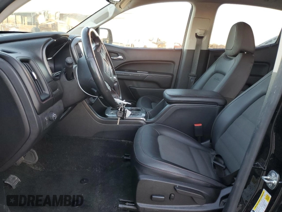 2016 GMC Canyon 2WD SLE with VIN 1GTG5CE33G1386325, listed as a Copart auction lot 86988134 with 91,610 mi miles and Salvage Title. Bid and sale history available at carsss.com. Image 7.