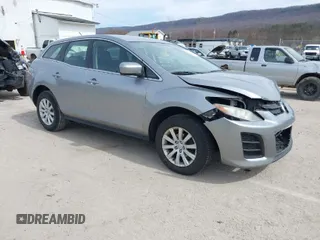 2010 Mazda CX-7 SV with VIN JM3ER2W58A0302929, listed as a IAAI auction lot 41839473 with 163,416 mi miles. Bid and sale history available at carsss.com. Image 1.
