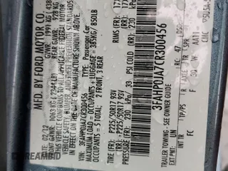 2012 Ford Fusion SEL z VIN 3FAHP0JA7CR300456, wystawiony jako Copart lot #44750125 z przebiegiem 144 788 mil mil oraz Szkoda całkowita • Salvage title. Historia ofert i sprzedaży dostępna na DreamBid. Obrazek 14.