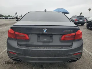 2019 BMW 5 Series M550i xDrive with VIN WBAJB9C59KB287501, listed as a Copart auction lot 59732425 with 74,345 mi miles and Salvage title. Bid and sale history available at DreamBid. Image 6.