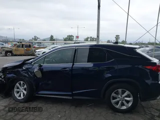2016 Lexus RX 350 z VIN 2T2BZMCA6GC052982, wystawiony jako IAAI lot #42185246 z przebiegiem 125 518 mil mil oraz . Historia ofert i sprzedaży dostępna na DreamBid. Obrazek 14.