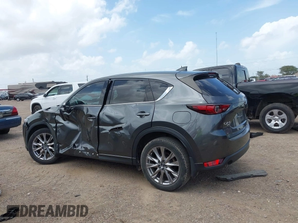 2021 Mazda CX-5 Grand Touring with VIN JM3KFBDM2M0431484, listed as a IAAI auction lot 42547665 with 34,757 mi miles and . Bid and sale history available at DreamBid. Image 15.