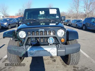 2010 Jeep Wrangler Unlimited Sahara with VIN 1J4HA5H16AL215659, listed as a IAAI auction lot 41749218 with 55,544 mi miles. Bid and sale history available at carsss.com. Image 12.