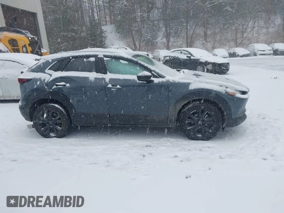 2023 Mazda CX-30 S Preferred z VIN 3MVDMBCM4PM574509, wystawiony jako IAAI lot #41522283 z przebiegiem 21 507 mil mil oraz . Historia ofert i sprzedaży dostępna na DreamBid. Obrazek 13.