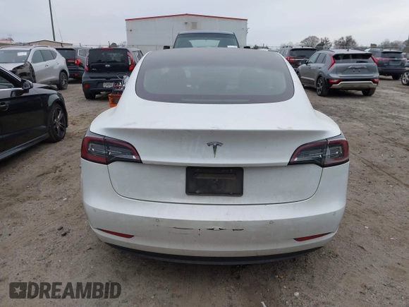 2020 Tesla Model 3 Standard Range Plus with VIN 5YJ3E1EA1LF799766, listed as a IAAI auction lot 41386508 with 90,000 mi miles. Bid and sale history available at carsss.com. Image 17.