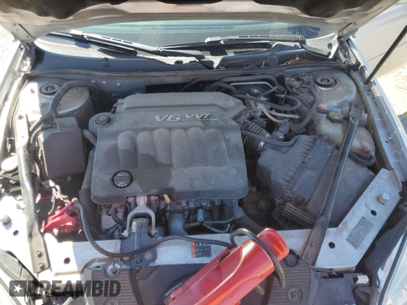 2014 Chevrolet Impala LT with VIN 2G1WB5E3XE1184419, listed as a Copart auction lot 51473045 with 98,299 mi miles and Salvage Title. Bid and sale history available at DreamBid. Image 12.