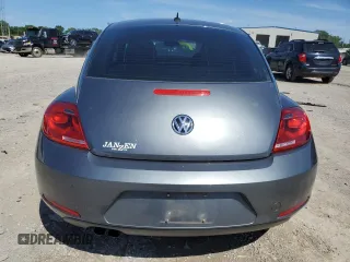2014 Volkswagen Beetle Entry z VIN 3VWF17AT0EM658329, wystawiony jako Copart lot #55049025 z przebiegiem Nie podano mil oraz Szkoda całkowita • Salvage title. Historia ofert i sprzedaży dostępna na DreamBid. Obrazek 6.