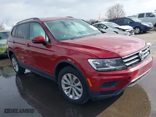 2018 Volkswagen Tiguan S with VIN 3VV1B7AX0JM043255, listed as a IAAI auction lot 41641512 with 79,069 mi miles. Bid and sale history available at carsss.com. Image 1.