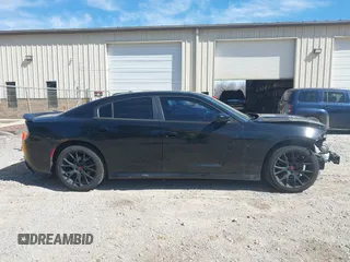 2019 Dodge Charger SXT with VIN 2C3CDXBG6KH702928, listed as a IAAI auction lot 41691312 with 108,832 mi miles and . Bid and sale history available at DreamBid. Image 14.