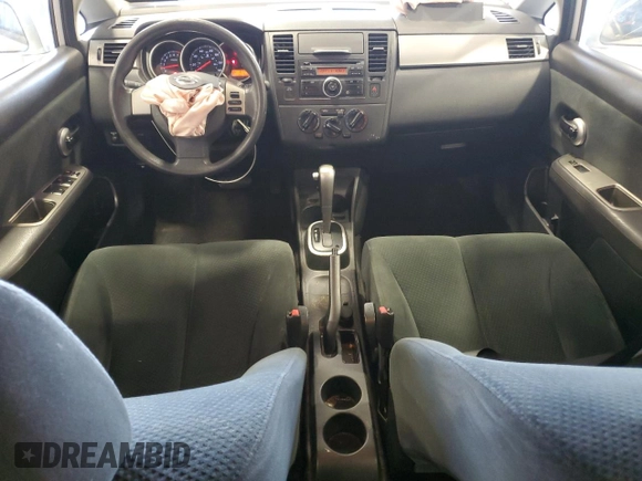 2011 Nissan Versa SL with VIN 3N1BC1CPXBL412353, listed as a Copart auction lot 62581505 with 107,447 mi miles and Salvage title. Bid and sale history available at DreamBid. Image 8.