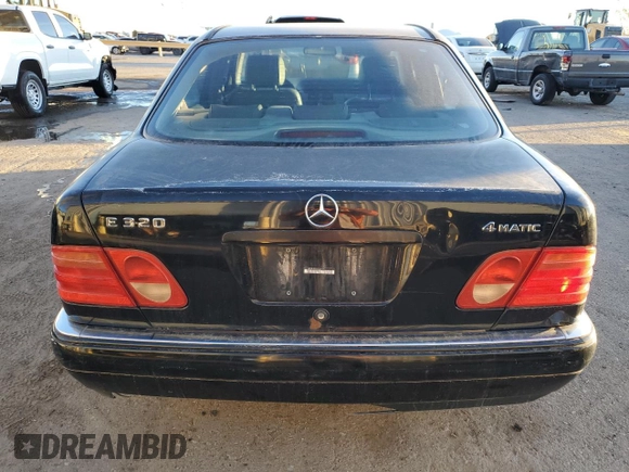 1999 Mercedes-Benz E-Class with VIN WDBJF82H9XX026911, listed as a Copart auction lot 48808835 with 205,953 mi miles and Salvage Title. Bid and sale history available at carsss.com. Image 6.