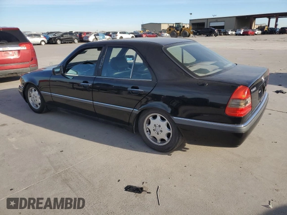 1994 Mercedes-Benz C with VIN WDBHA28E5RF090458, listed as a Copart auction lot 82380184 with Not Provided miles and Salvage Title. Bid and sale history available at carsss.com. Image 2.