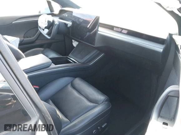 2022 Tesla Model X with VIN 7SAXCBE56NF329657, listed as a IAAI auction lot 41400629 with Not Provided miles and . Bid and sale history available at DreamBid. Image 5.